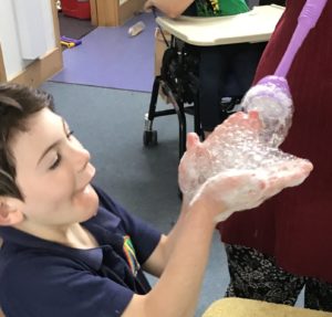 Bubble party sensory bubbles play blowing foam in SEND school ADHD. special needs birthday party.