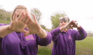bubble blowing with hands explaining demonstrating