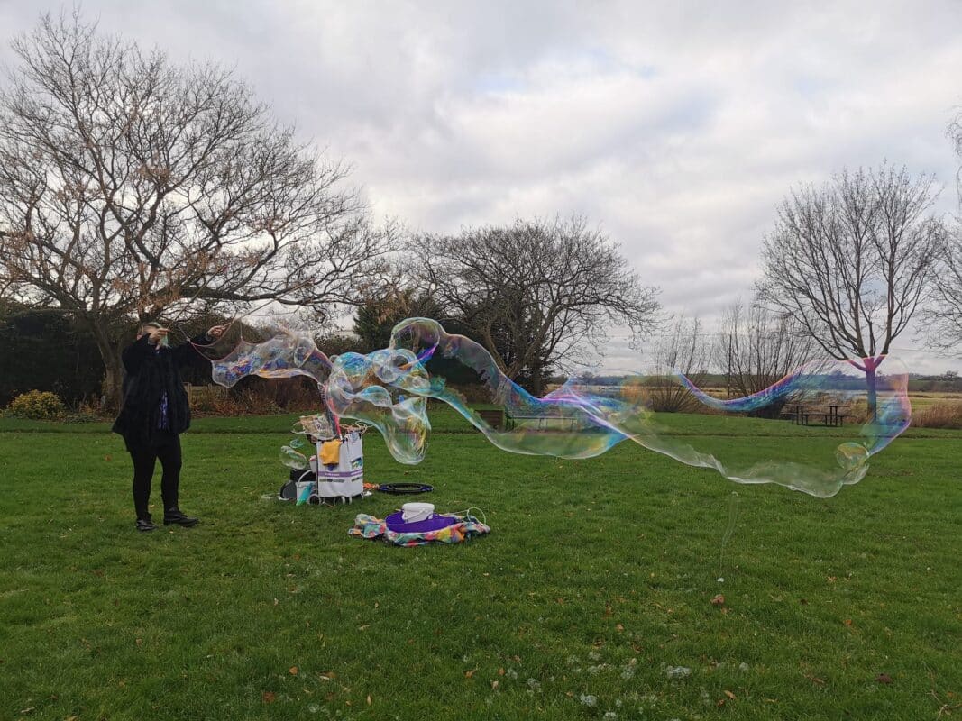 large bubble wand. bubble songs.