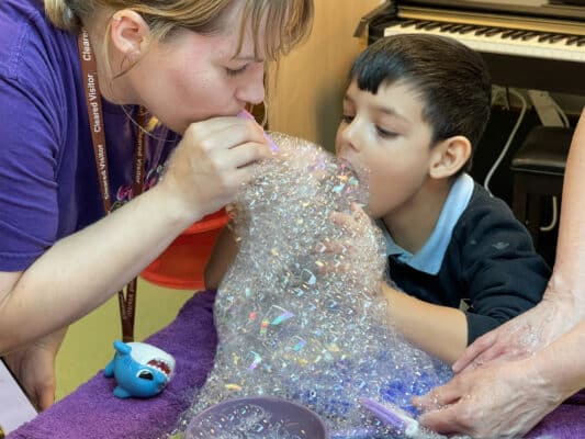 Blowing foam workshop for special needs sensory bubbles for school workshops.