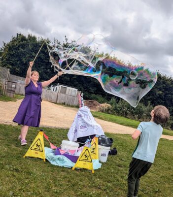 Birthday party entertainer kids outdoor bubble party