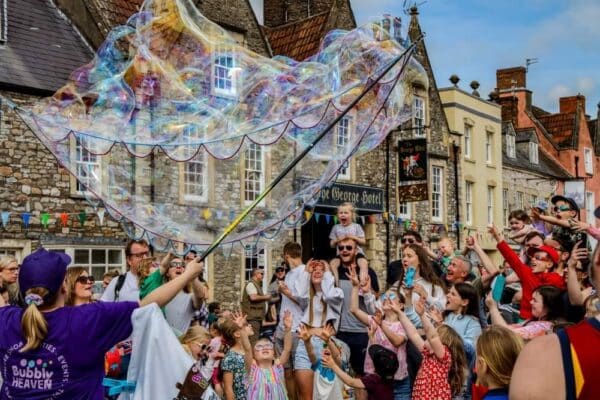 Kids entertainer event bubbles Tetbury. Bubble magician and artist.