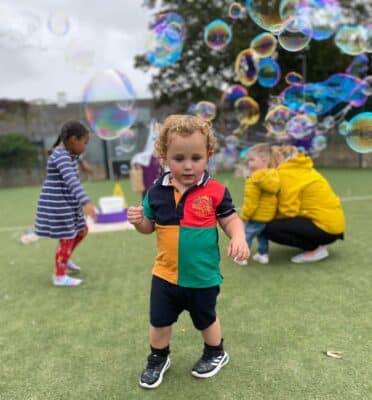 customer photo - MAPS - happy kids playing with bubbles