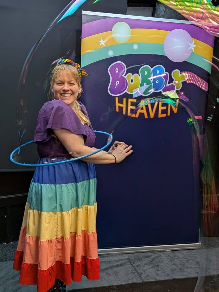 Cheryl Holley, Holly Pop, making a giant bubble at a Bubbly Heaven show