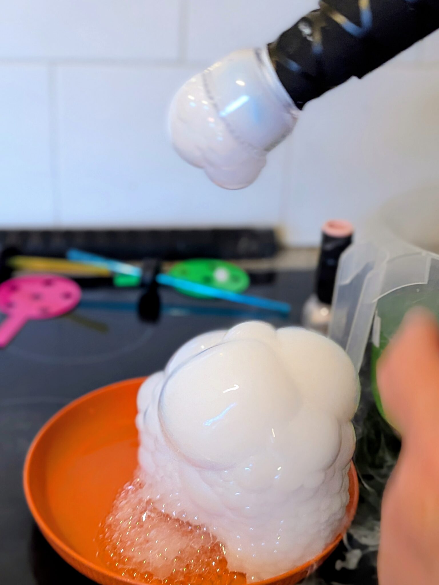 Smoke filled white coloured bubbles and soap foam